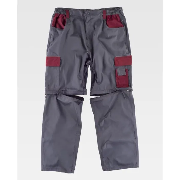 Calça combinada desmontável com reforços e debruns refletores.